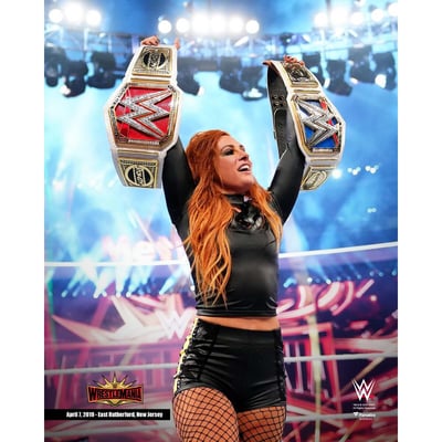 Becky Lynch WWE Unsigned Fanatics Authentic WrestleMania 35 Raising Both Titles Photograph
