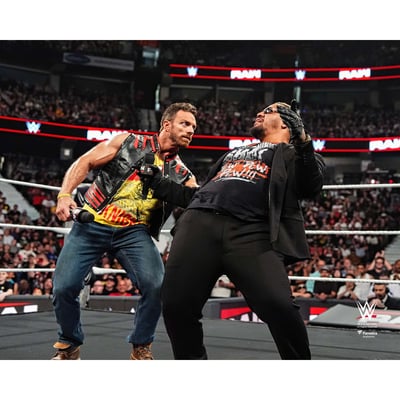 Solo Sikoa & LA Knight WWE Unsigned Fanatics Authentic In-Ring Dodging a Warning Shot Photograph